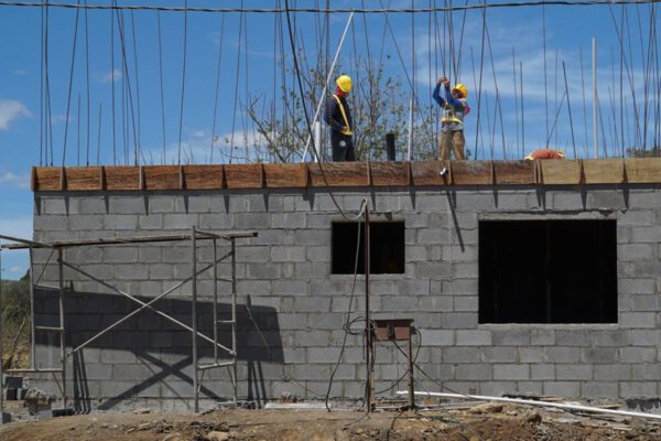 onstruction of affordable housing using Resin8 concrete blocks in Costa Rica and South Africa, showcasing practical e‑waste solutions for sustainable building.